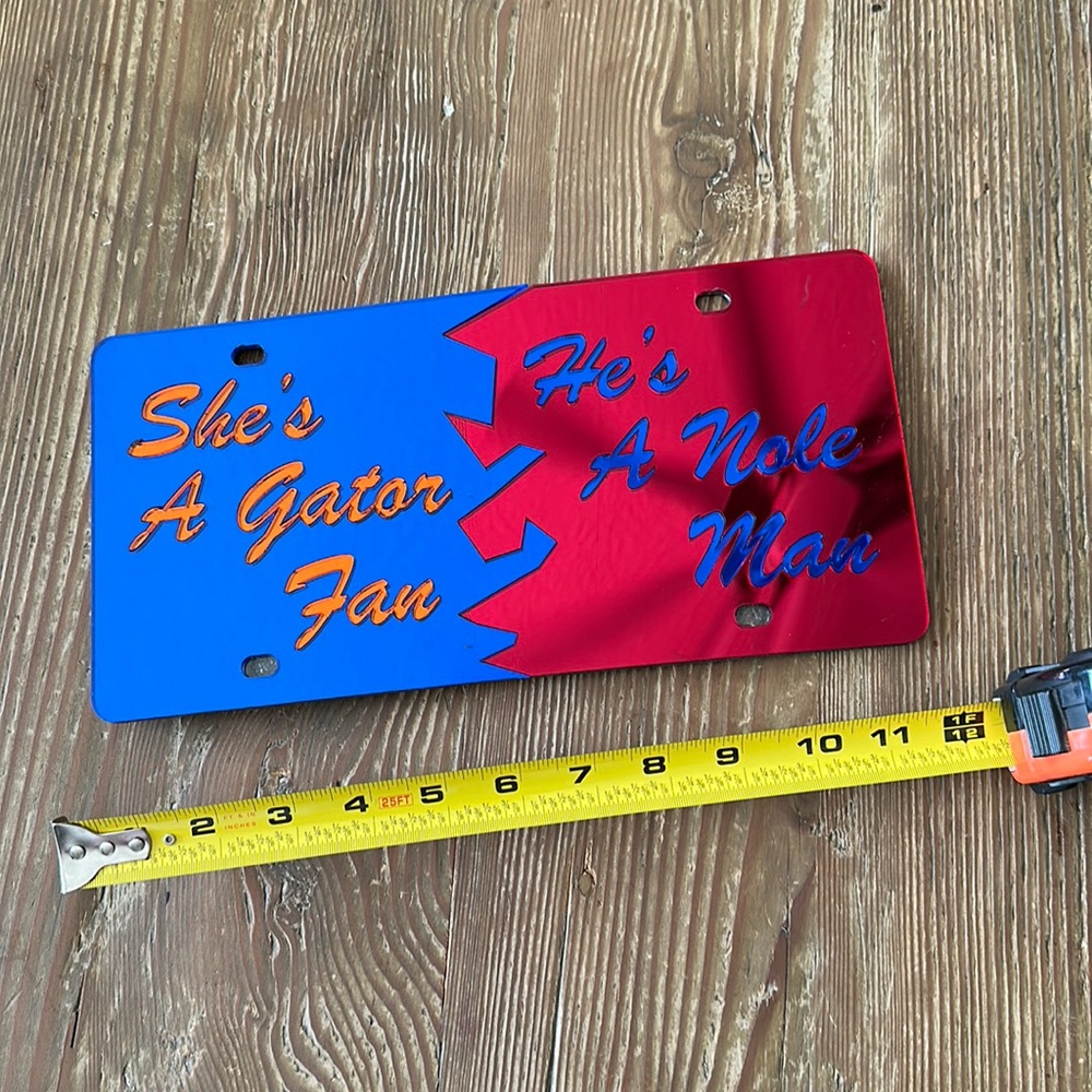 MIRROR ACRYLIC CAR TAG W/ “She’s a Gator Fan / He’s a Nike manGATOR